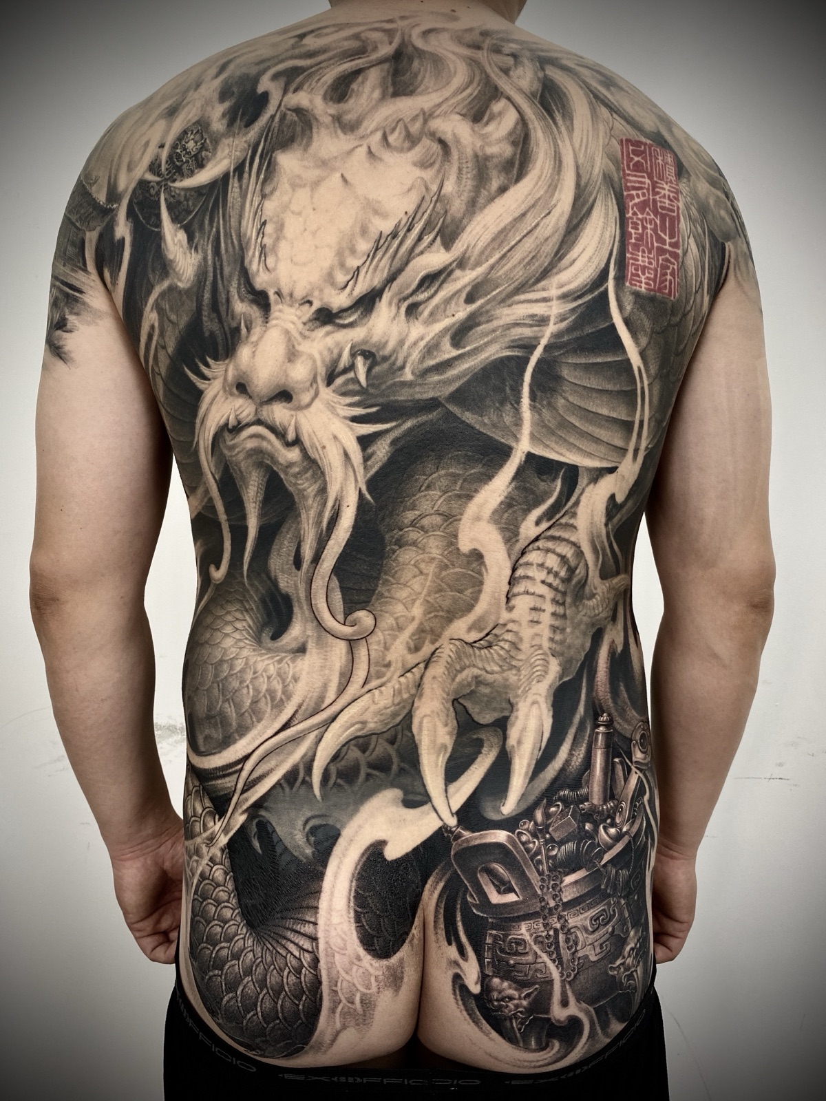 Signature biomechanical tattoo by Heng Yue