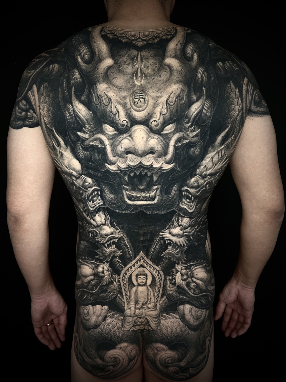 Stone carving tattoo
